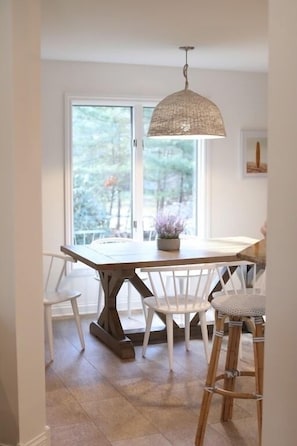 Dining room table off kitchen and living room.