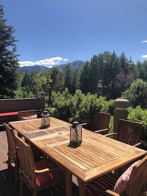 Large deck dining area - seats 8 for dinner with spectacular views