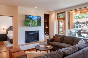 Comfortable living area with smart TV, puzzles and games