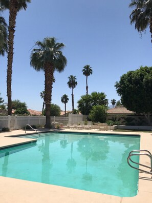 Large gated pool with jacuzzi steps from home 