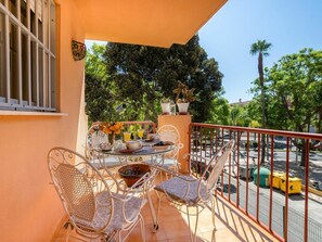 Furniture, Table, Property, Chair, Building, Flowerpot, Sky, Window, Shade, Plant