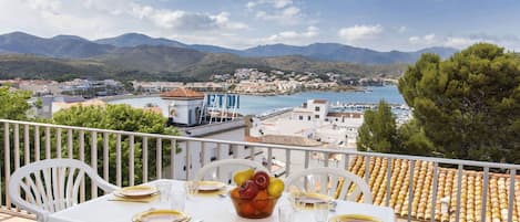 Cloud, Table, Sky, Furniture, Property, Tableware, Building, Chair, Water, Outdoor Table