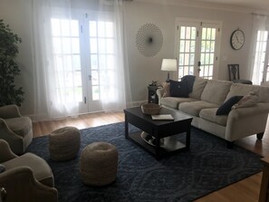 Large, high ceiling living area at the front of the house