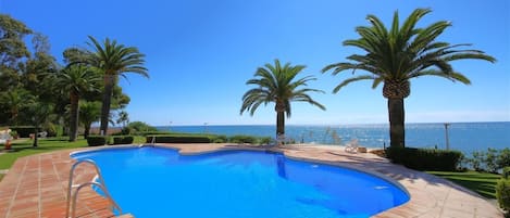 Fantastic communal pool with gardens and sea views