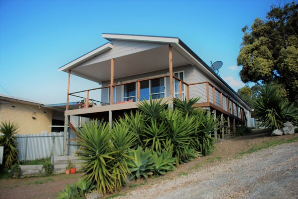 Built in 2016, this modern home has a spacious deck and is a great home base.