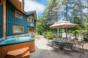 Exterior - Private hot tub and patio furniture for outdoor summer dining.