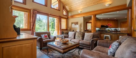 Living Room - High vaulted ceilings, flooded with natural light, open concept, classic ski chalet home