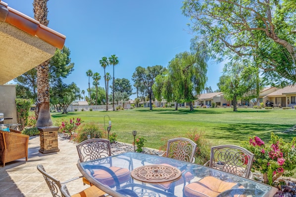 Enjoy the spacious back patio with Pool views.