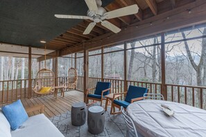 Relax on the spacious back deck offering tranquil views of the surrounding forest, perfect for morning coffee or evening sunsets.
