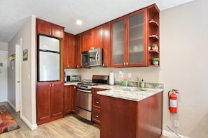 Kitchen with toaster oven, Keurig, slow cooker and more
