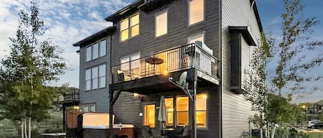 Exterior of Mountain Gypsy with hot tub, BBQ, and outdoor seating