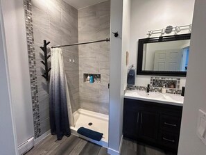 bathroom shower and double sink