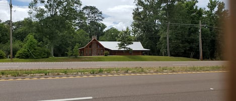Log Home Seen Front Front Along US 61N