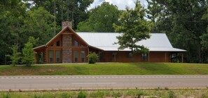 Front View - Note Covered Porch Along Front -- Wraps Around North Side and Rear