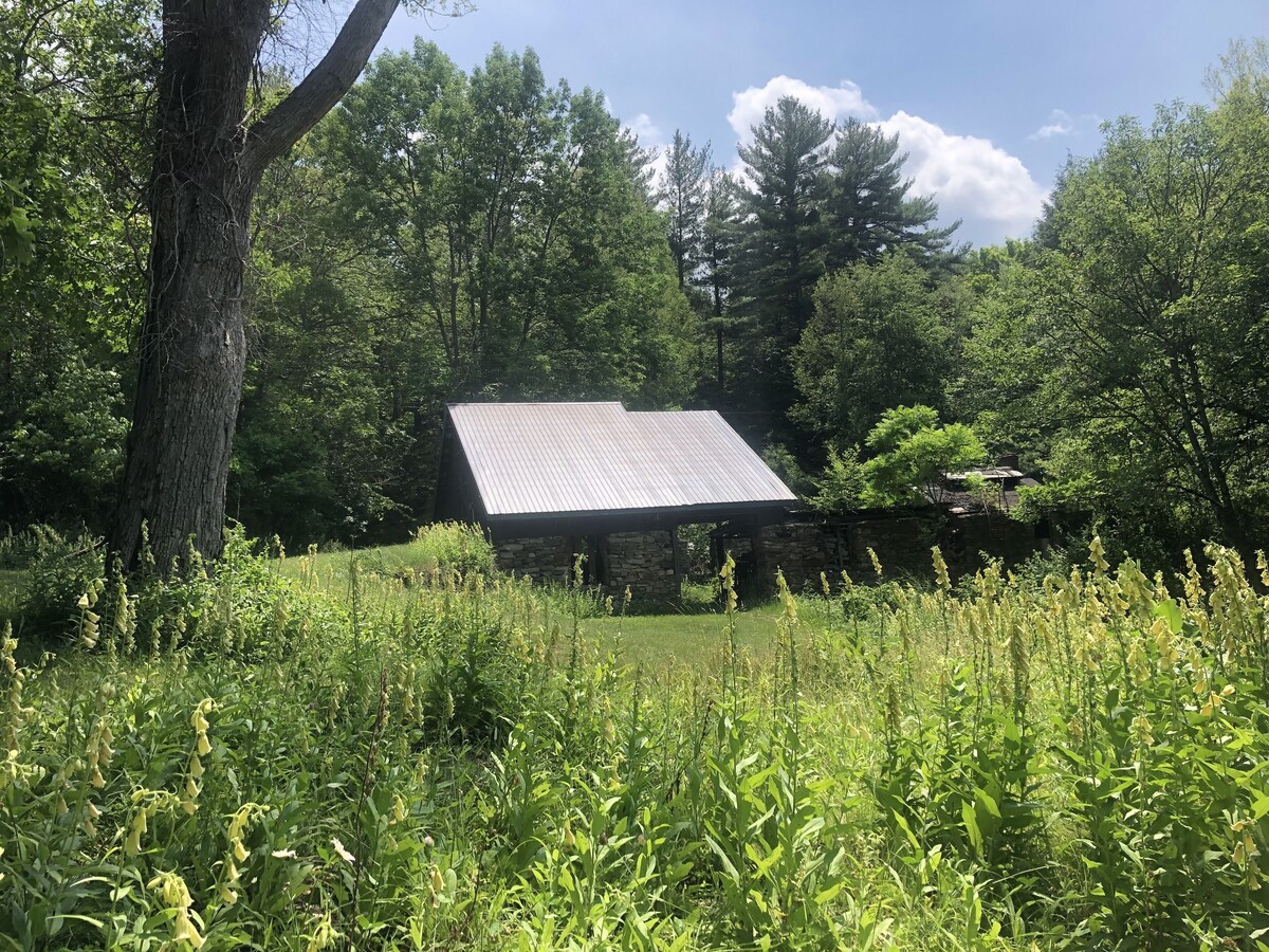Private 6 acre waterfront estate on Lake George with protected sandy bay.