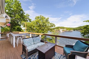 Main level open deck seating with amazing lake views