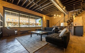 Comfortable living space on the main level with one-way glass windows across from the Irma Hotel