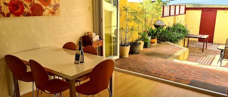 Dining area opening out to rear courtyard 