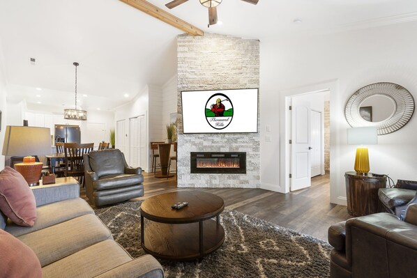Open Floor Concept with Cable, Flat Screen and Seasonal Fireplace