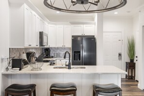 Full Kitchen With Extra Bar Seating