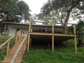 Wood deck overlooking Tres Palacios River