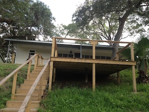 Wood deck overlooking Tres Palacios River