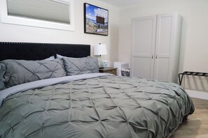 Master bedroom with king bed, comfy memory foam mattress, top-quality linens.