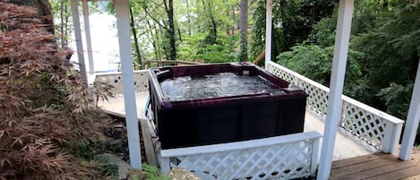 Soak it up in the hot tub and watch the boats drive by. 