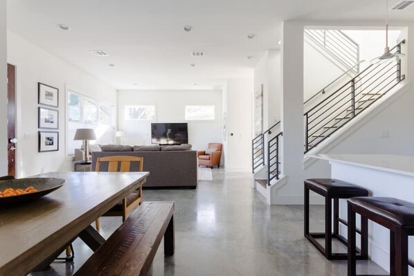 Tall ceilings and saturated with daylight.