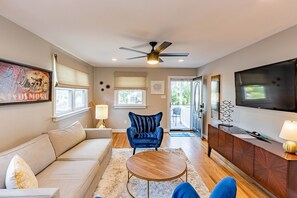 Living room featuring hardwood floors that flow throughout
