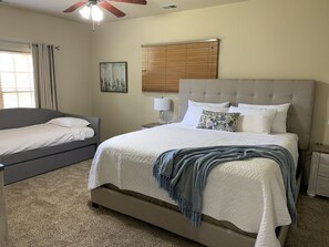 Master bedroom with very comfy king bed and daybed with trundle. 