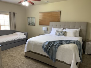 Master bedroom with very comfy king bed and daybed with trundle.