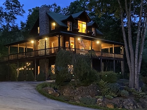 Twilight view from the lower driveway with a peaceful mountain backdrop!