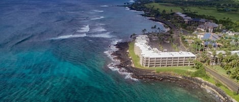 Ariel photo of Kuhio Shores. Swimming/snorkel beach located on other side 