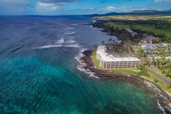 Ariel photo of Kuhio Shores. Swimming/snorkel beach located on other side 