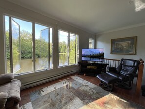 Living room with Lake View and Smart TV