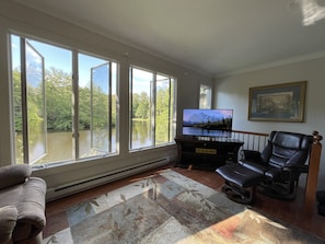 Living room with Lake View and Smart TV