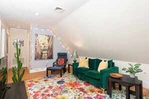 Kick back, summer style! ☀️ Step into this cozy, sun-kissed living room, designed for laid-back lounging and total relaxation. #SummerChillZone #CozyVibe