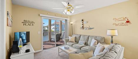 Enjoy the lake view from the living room at Tilghman Shores 