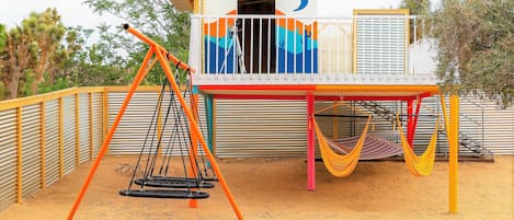 Star Gazing deck is a MUST see in the desert. swings, rope chairs, hammock