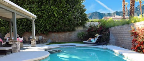 Enjoy some of the mountain views in the backyard while playing in the pool.