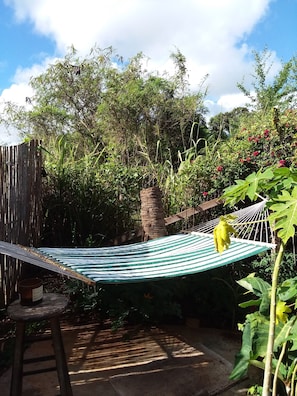 Relax and enjoy the lush backyard