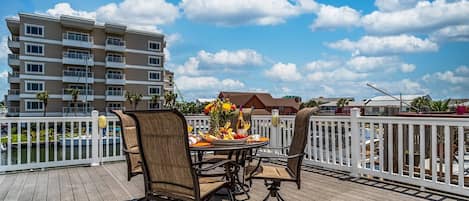 Entertaining Made Easy with the Water View of the Harbor Isle Canal from Upper Deck