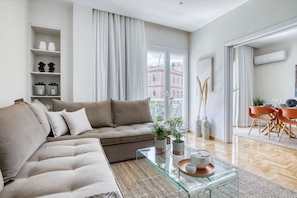 Livin room and sofa bed with double size bed and direct views to Acropolis