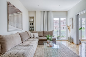 Livin room and sofa bed with double size bed and direct views to Acropolis