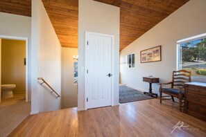 Front door entry and stairs to lower level