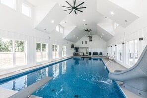 Indoor pool with slide and diving board