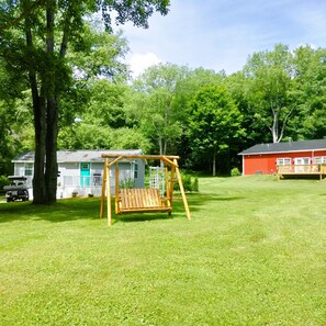 Shared lawn and swing, although it is rarely in use by others