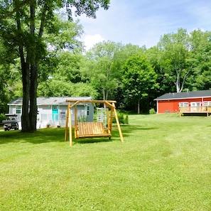 Shared lawn and swing, although it is rarely in use by others