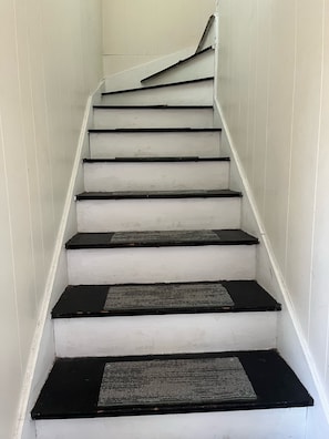 Interior stairs to Carriage House apartment